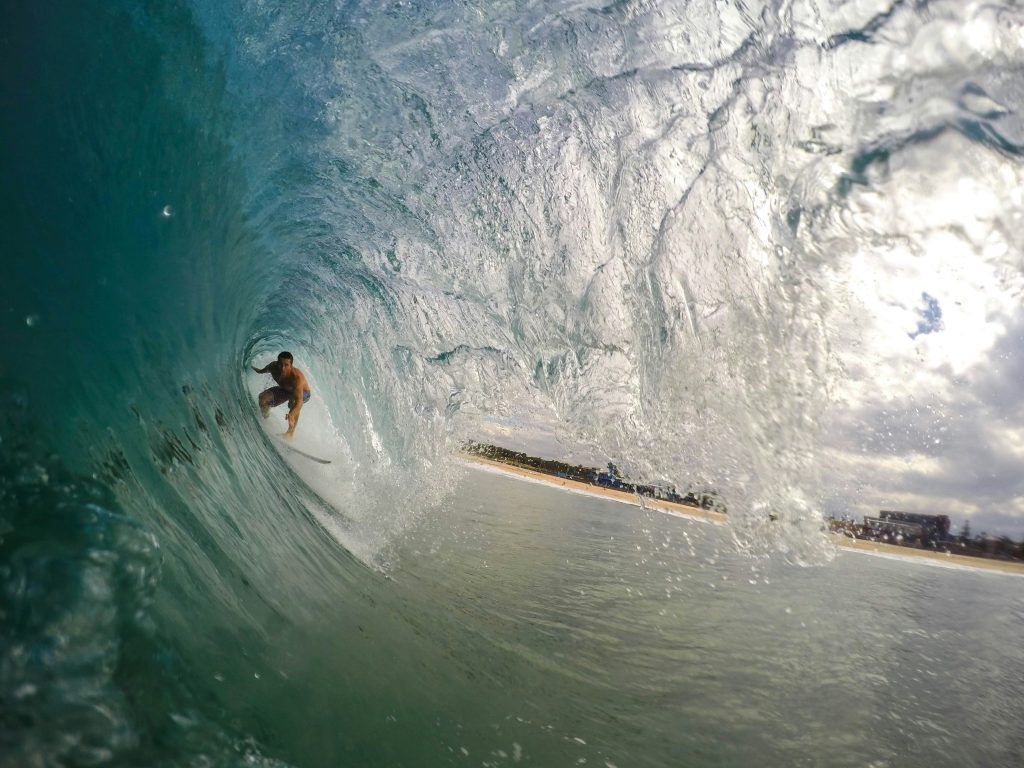 A surfer in a tunnel
